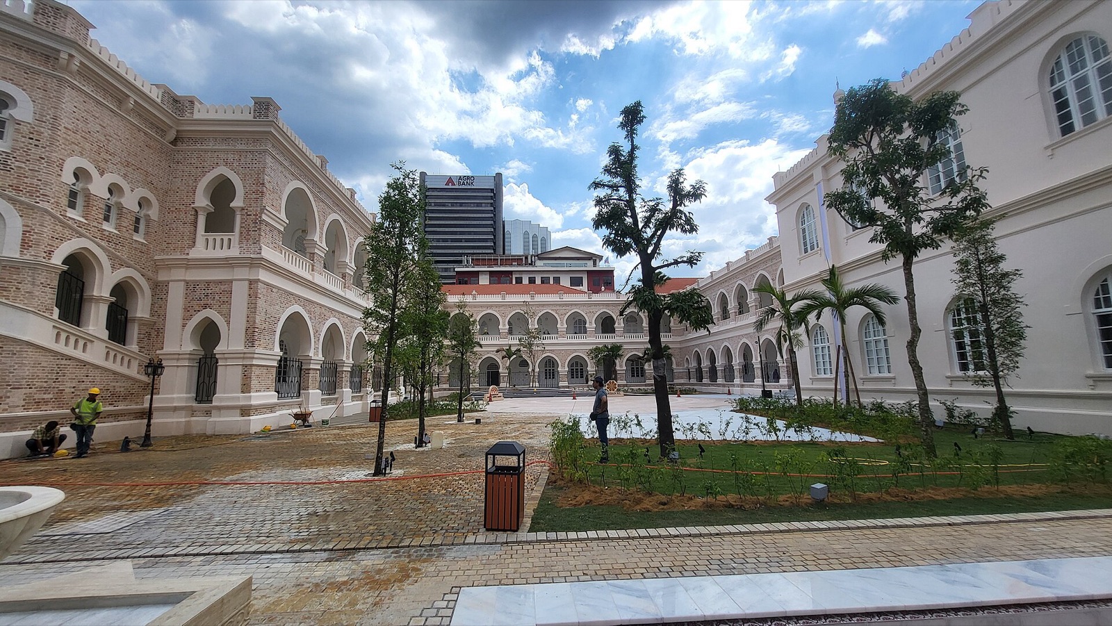 Restored brick-and-plaster arcades around a courtyard of the Sultan Abdul Samad Building complex.
